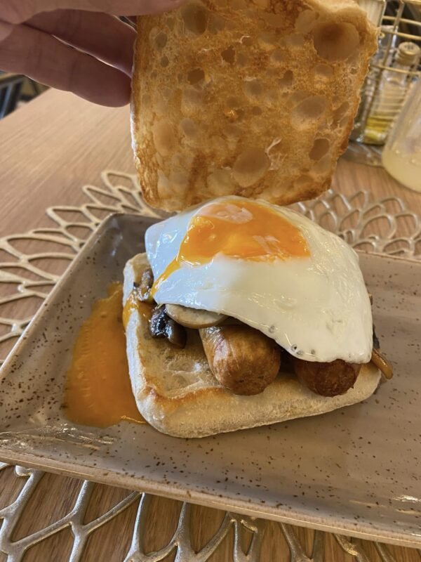 Bun with Sausage, Bacon, Egg & Mushroom